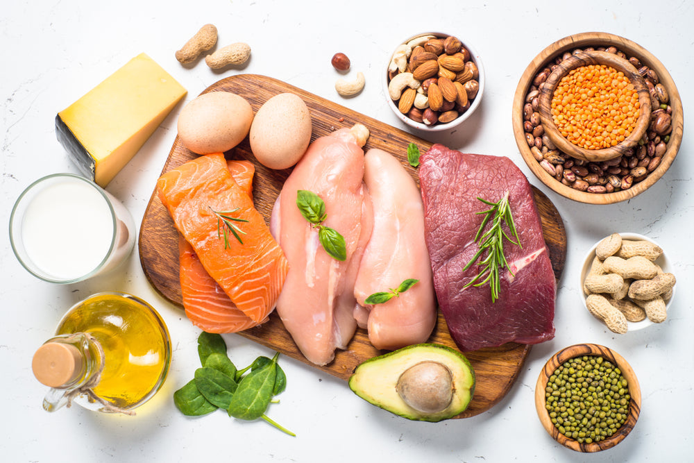 Protein rich foods on a table and cutting board