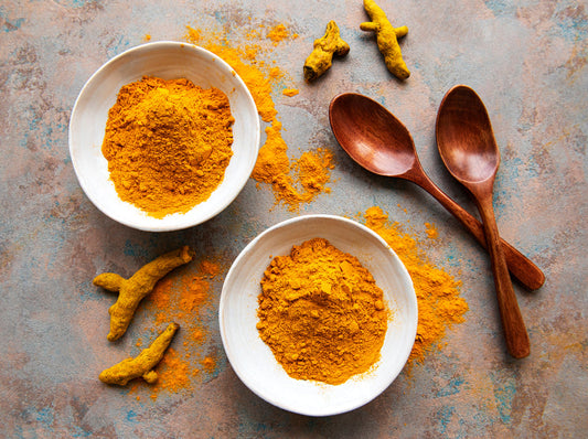 Turmeric Curcumin Powder in a white bowl