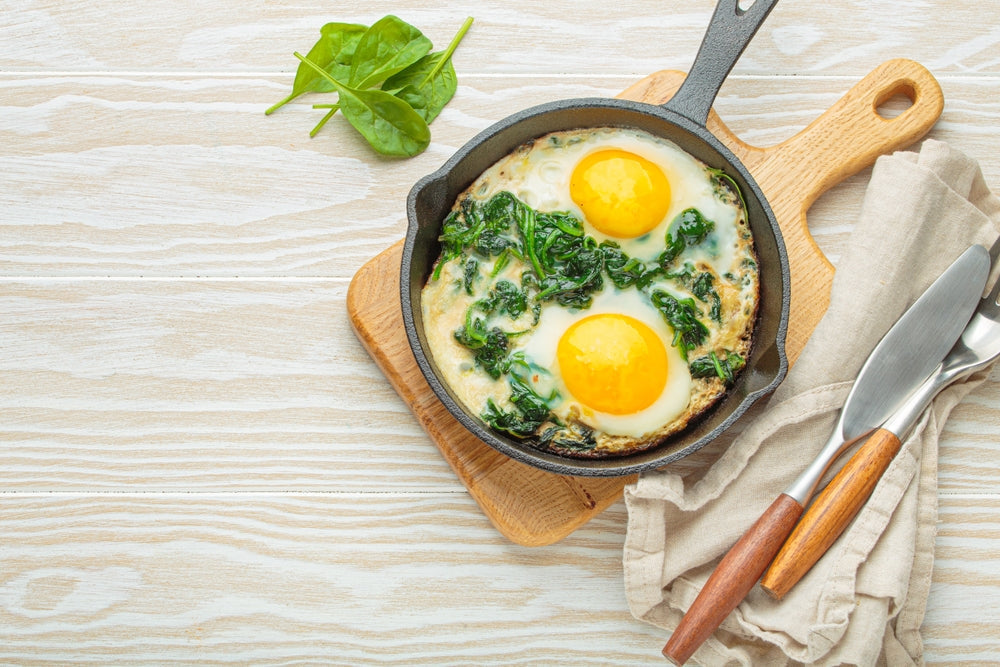 healthy omellete with spinach in a skillet