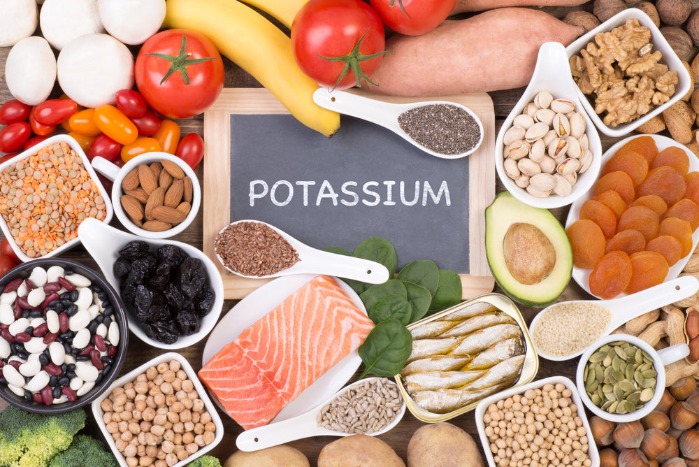Healthy Foods That Are High in Potassium around a sign that says potassium
