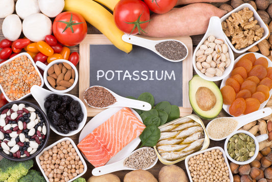 Healthy Foods That Are High in Potassium around a sign that says potassium