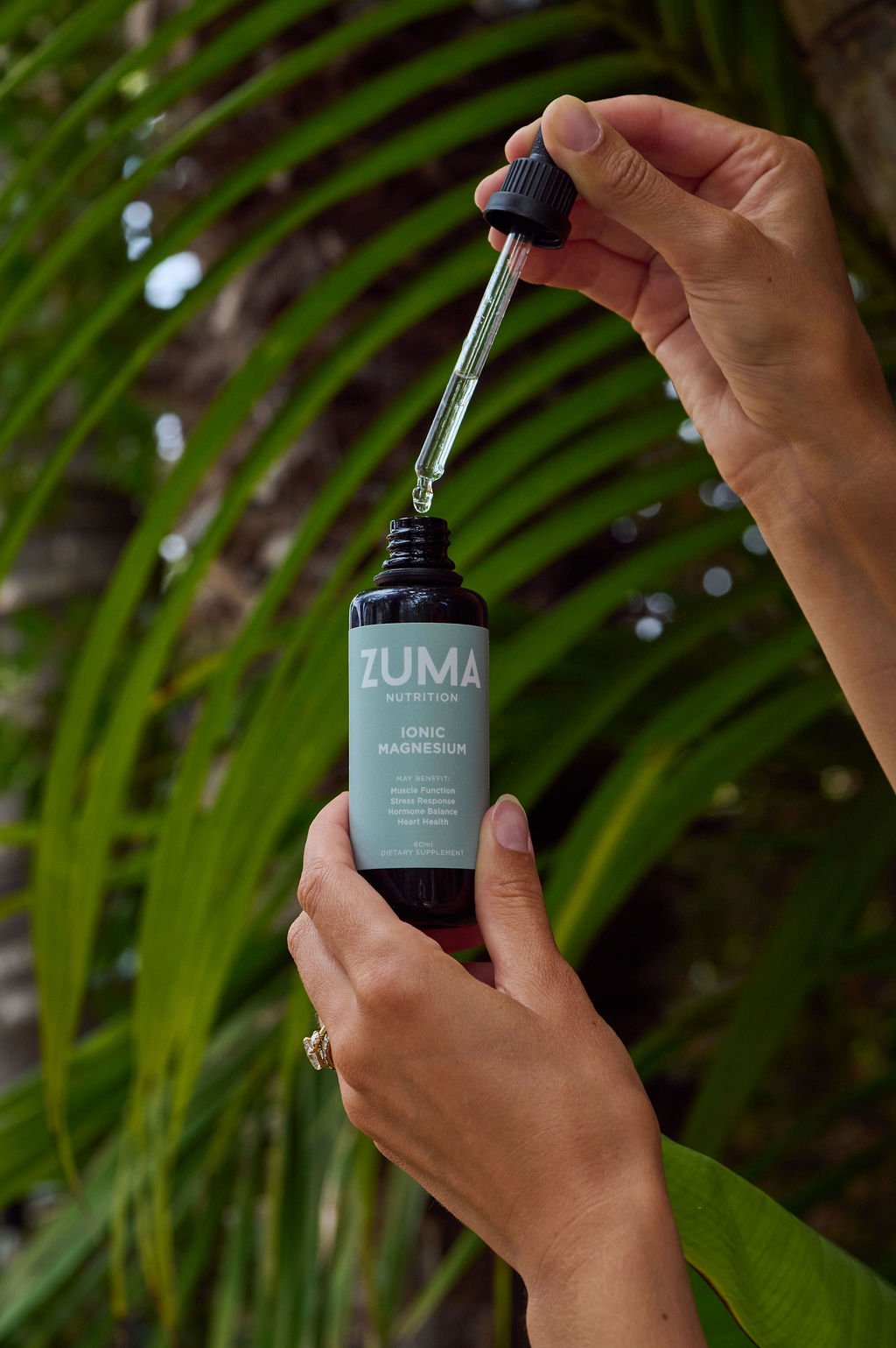 Liquid ionic magnesium dropper over the Zuma Nutrition Ionic Magnesium bottle