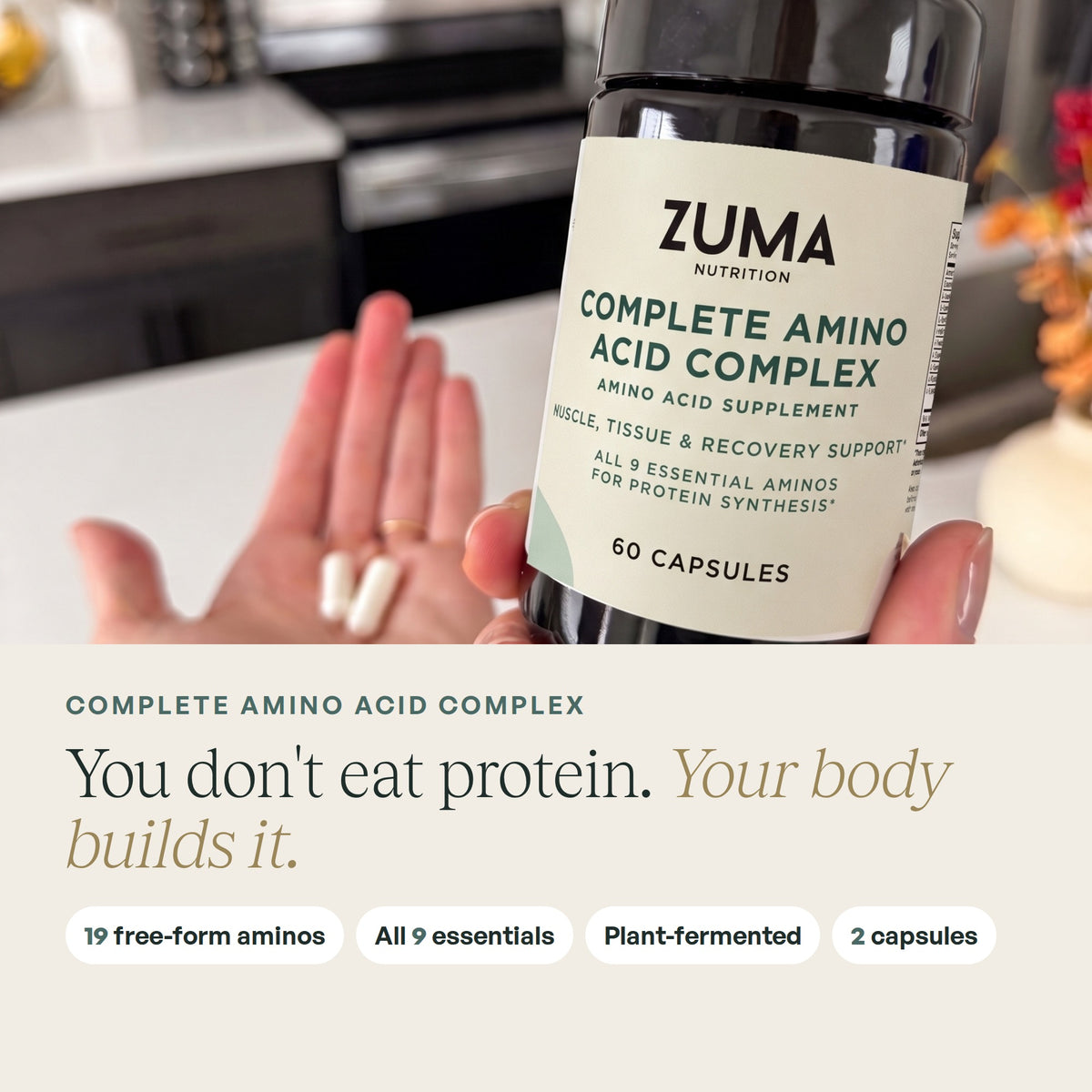 Zuma Nutrition Complete Amino Acid Complex jar in hand