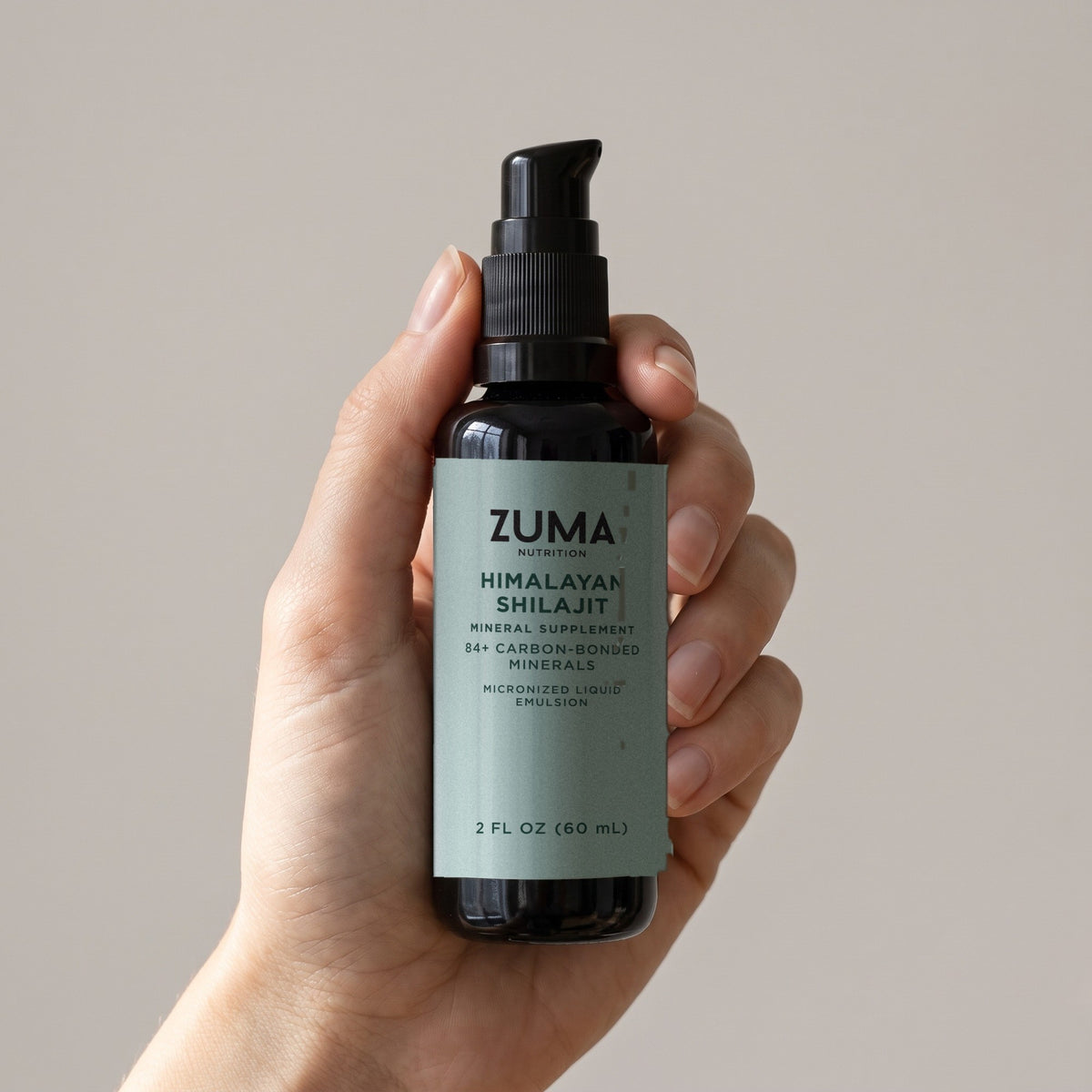 Zuma Nutrition Himalayan Shilajit in hand